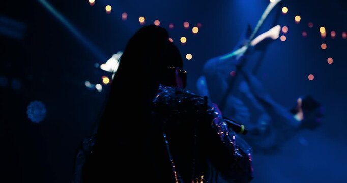 Gig Of Trendy Female Singer In Nightclub, Air Gymnastic Show, Woman Aerialist Flying Above Stage