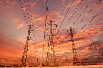 silhouette high voltage pole on sky sunset background.	