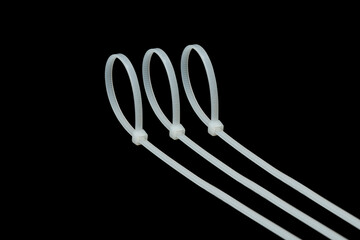 White Cable Tie in black isolated background | Self Locking Nylon Cable tie 