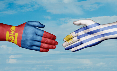 Uruguay and Mongolia country handshaking with flags, consensus concept international co-operation illustration