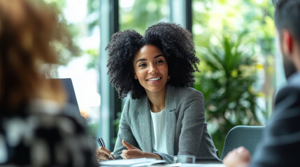 HR professionals reviewing retention statistics and discussing employee satisfaction metrics