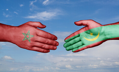 Mauritania and Morocco country handshaking with flags, consensus concept international co-operation illustration