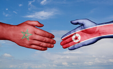 North Korea and Morocco country handshaking with flags, consensus concept international co-operation illustration