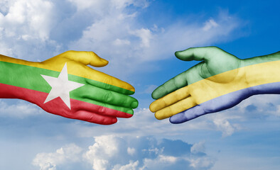 Gabon and Myanmar country handshaking with flags, consensus concept international co-operation illustration