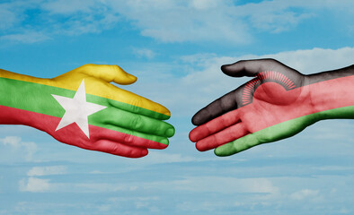 Malawi and Myanmar country handshaking with flags, consensus concept international co-operation illustration