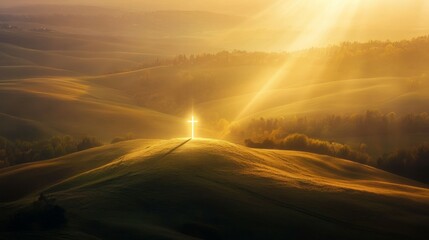 A cross stands atop a hill bathed in golden light, creating a serene and spiritual scene.