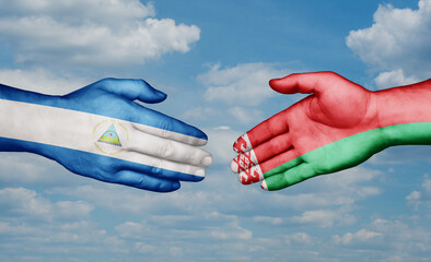 Belarus and Nicaragua country handshaking with flags, consensus concept international co-operation illustration