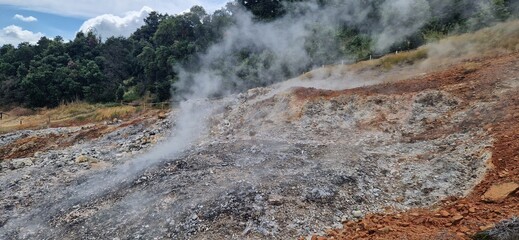 Smoked land in  Geothermal Natural Park Biancane, Parco Naturalistico Geotermico Delle Biancane, Italy. June 25, 2024.