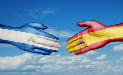 Spain and Nicaragua country handshaking with flags, consensus concept international co-operation illustration
