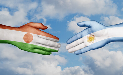 Argentina and Niger country handshaking with flags, consensus concept international co-operation illustration