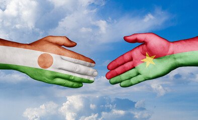 Burkina Faso and Niger country handshaking with flags, consensus concept international co-operation illustration