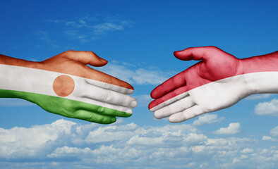 Indonesia and Niger country handshaking with flags, consensus concept international co-operation illustration
