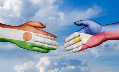 Philippines and Niger country handshaking with flags, consensus concept international co-operation illustration