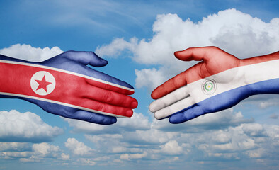 Paraguay and North Korea country handshaking with flags, consensus concept international co-operation illustration