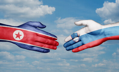 Slovenia and North Korea country handshaking with flags, consensus concept international co-operation illustration