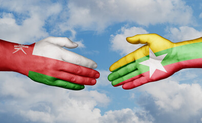 Myanmar aka Burma and Oman country handshaking with flags, consensus concept international co-operation illustration