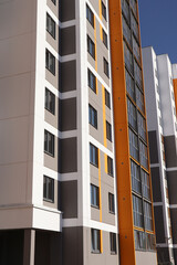 Modern panel multi-storey building bottom-up view. Modern view of the facade outside the house in a modern quarter