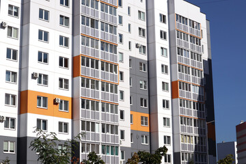 Modern high-rise buildings close-up windows of the house. Multi-storey residential building