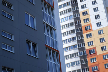Modern high-rise buildings close-up windows of the house. Multi-storey residential building