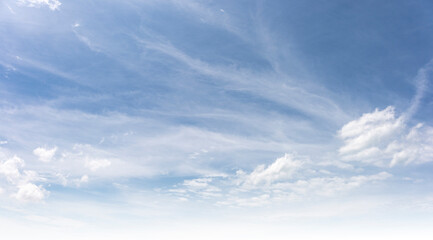 Obraz premium Bright Blue Sky with White Cloud background: A Clear Summer Day with Light Gradients winter cloudy and Nature Beauty texture, Horizon air in summer day. abstract Landscape spring View