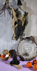 Spooky halloween  scene with a with and spiders.