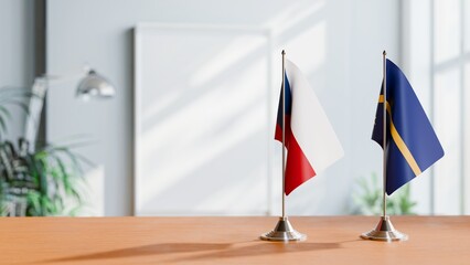 FLAGS OF CZECH REPUBLIC AND NAURU ON TABLE