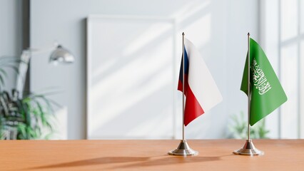 FLAGS OF CZECH REPUBLIC AND SAUDI ARABIA ON TABLE