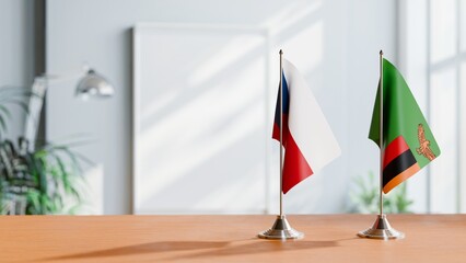 FLAGS OF CZECH REPUBLIC AND ZAMBIA ON TABLE