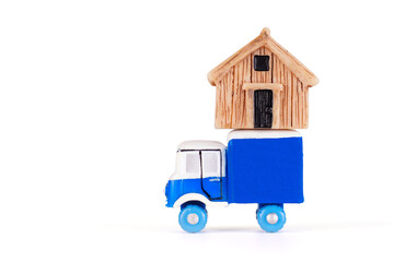 Toy Truck Carrying Model House for Creative Transportation Concept