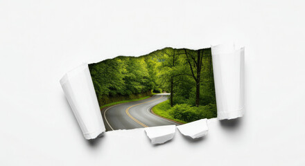 Torn white paper revealing serene road and lush greenery.