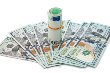 Roll of euros surrounded by hundred dollar bills