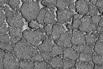 Cracked asphalt texture. Top view. Asphalt. Road background