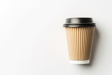 Ribbed coffee cup on white with copy space