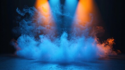 An atmospheric shot of vibrant blue and orange smoke illuminated by dramatic lighting.