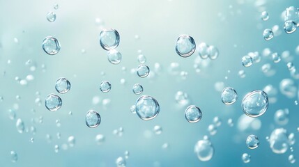 Close-up of shimmering water bubbles suspended in a soft blue background, creating an ethereal and tranquil atmosphere.