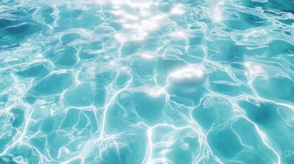 Obraz premium Crystal clear turquoise water reflecting sunlight, creating a serene and inviting atmosphere.