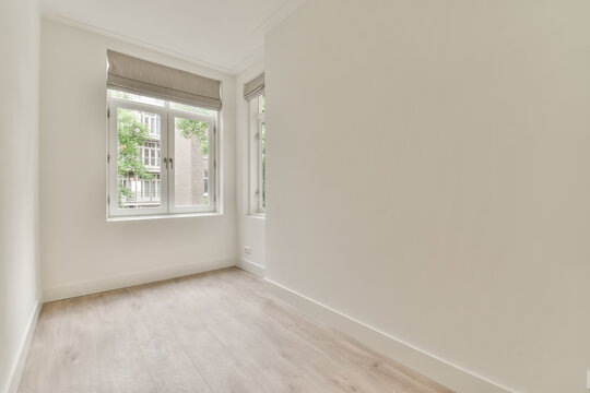 Modern empty room with window and natural light
