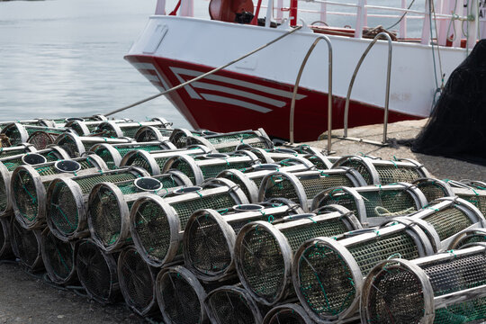 Fish traps and boat preparation for the fishing season.