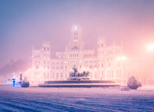 Fototapeta Madrid cityscape blanketed in a mystic snow