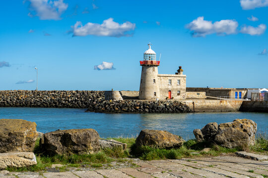 Beautiful seascape - Howth lighthouse with boat