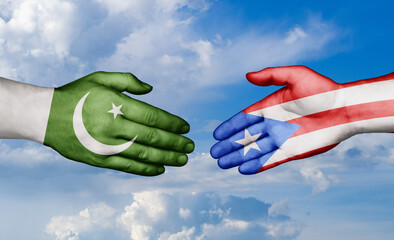 Puerto Rico and Pakistan country handshaking with flags, consensus concept international co-operation illustration