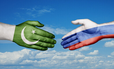 Russian Federation and Pakistan country handshaking with flags, consensus concept international co-operation illustration