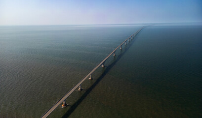 Confederation Bridge (French: Pont de la Confédération) is a box girder bridge carrying the Trans-Canada Highway across the Abegweit Passage of the Northumberland Strait, aerial view