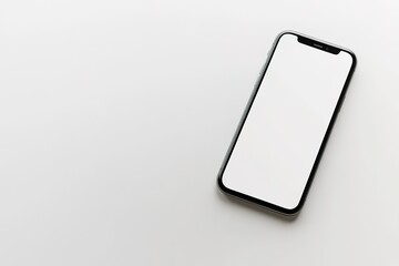 Smartphone with blank screen on white surface