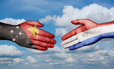 Paraguay and Papua New Guinea country handshaking with flags, consensus concept international co-operation illustration