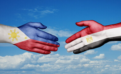 Egypt and Philippines country handshaking with flags, consensus concept international co-operation illustration