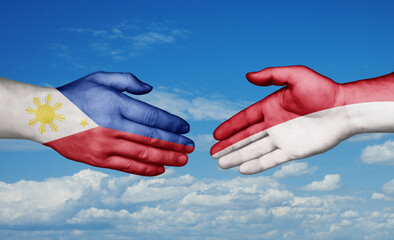 Indonesia and Philippines country handshaking with flags, consensus concept international co-operation illustration