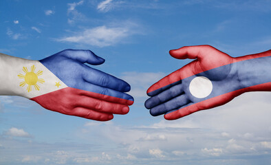Laos and Philippines country handshaking with flags, consensus concept international co-operation illustration