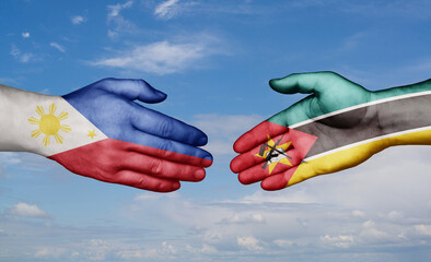 Mozambique and Philippines country handshaking with flags, consensus concept international co-operation illustration