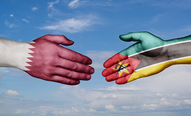 Mozambique and Qatar country handshaking with flags, consensus concept international co-operation illustration